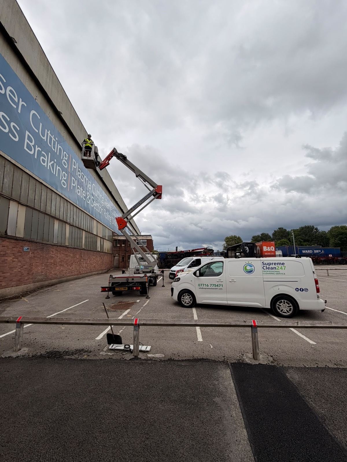 Supreme Clean 22-metre van-mounted cherry picker working at height on a commercial unit