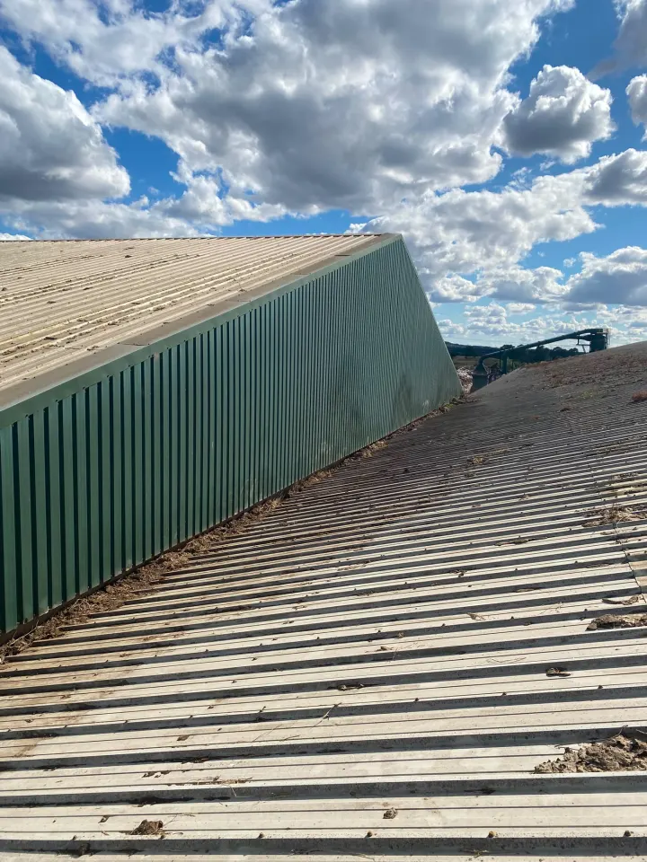 Large commercial roof sections after professional roof cleaning