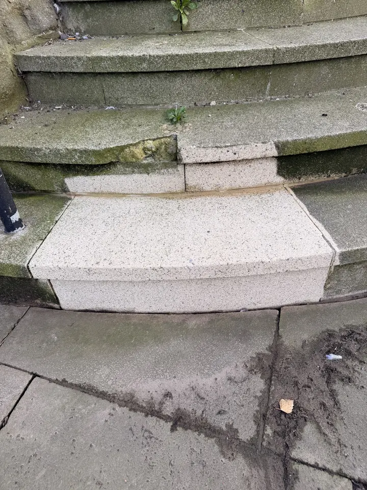 Stone step cleaned back to its original colour