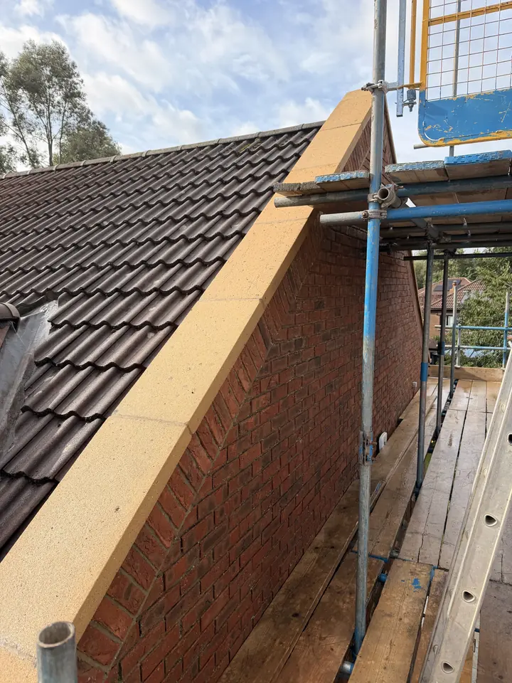 Clean brick gable and coping