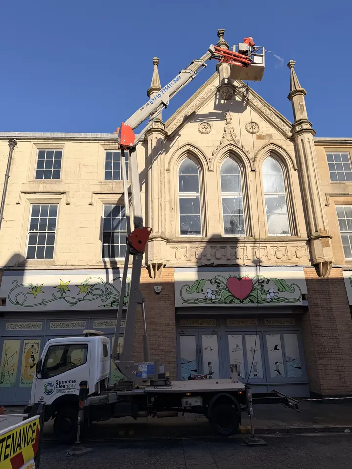 Cherry picker DOFF cleaning a heritage facade