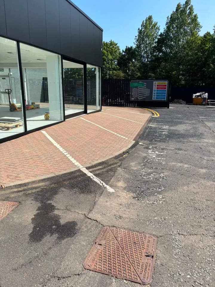 Professionally cleaned block-paved commercial entrance