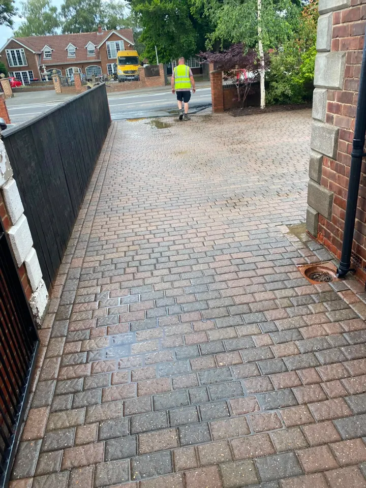 Freshly cleaned residential block-paved driveway