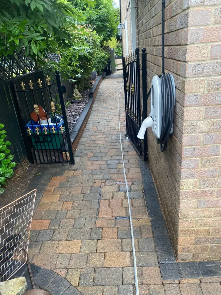 Cleaned paved side path alongside a home